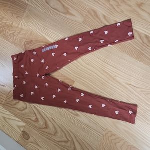 Brown heart pattern leggings Size 10